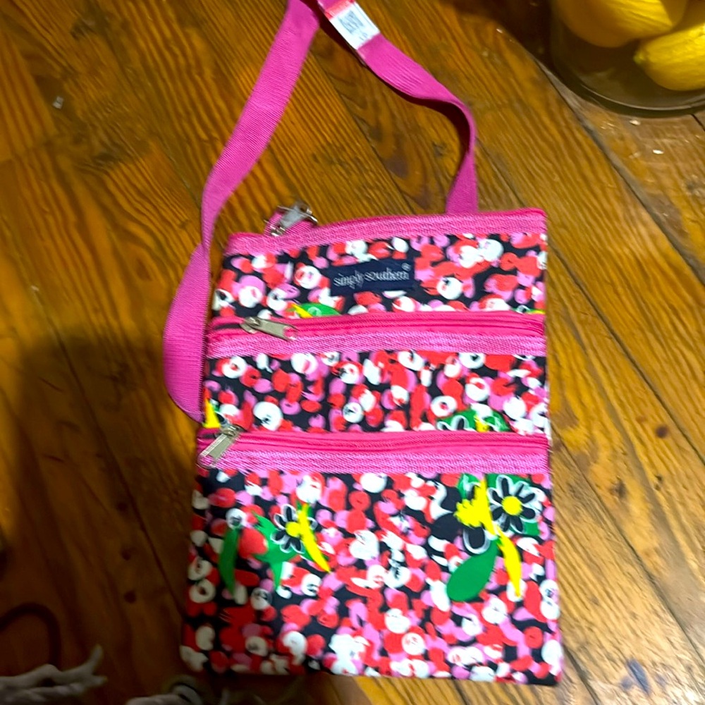 NEW without tags Vera Bradley crossbody pink with several different colors
